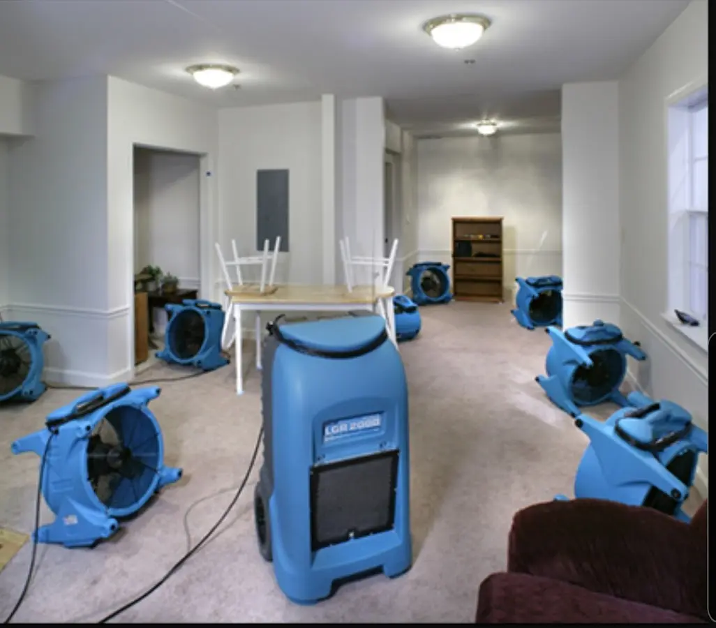 Air movers and dehumidifier setup for Water Damage Restoration in North Vernon
